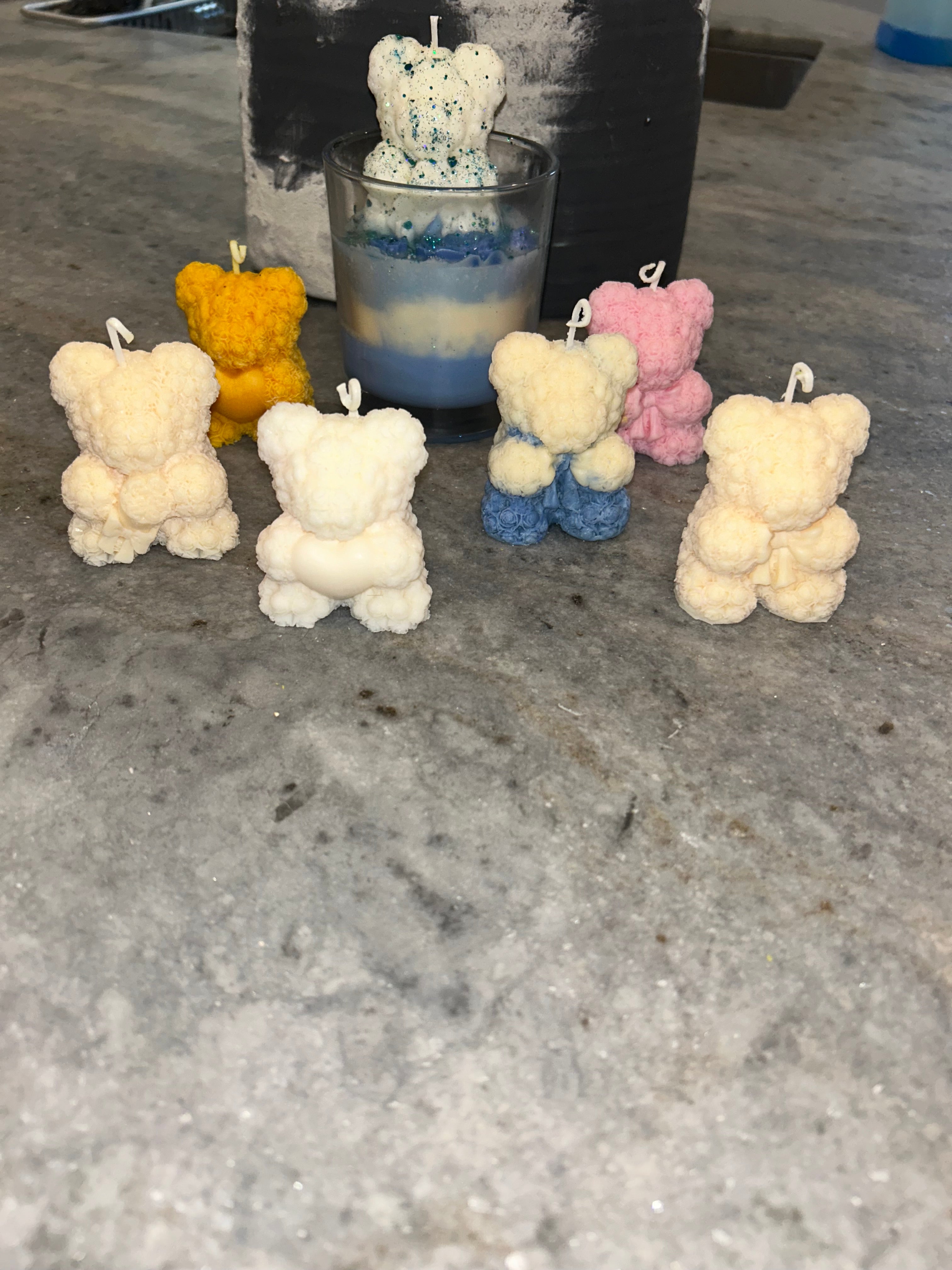 Single bear candle in glass container with design